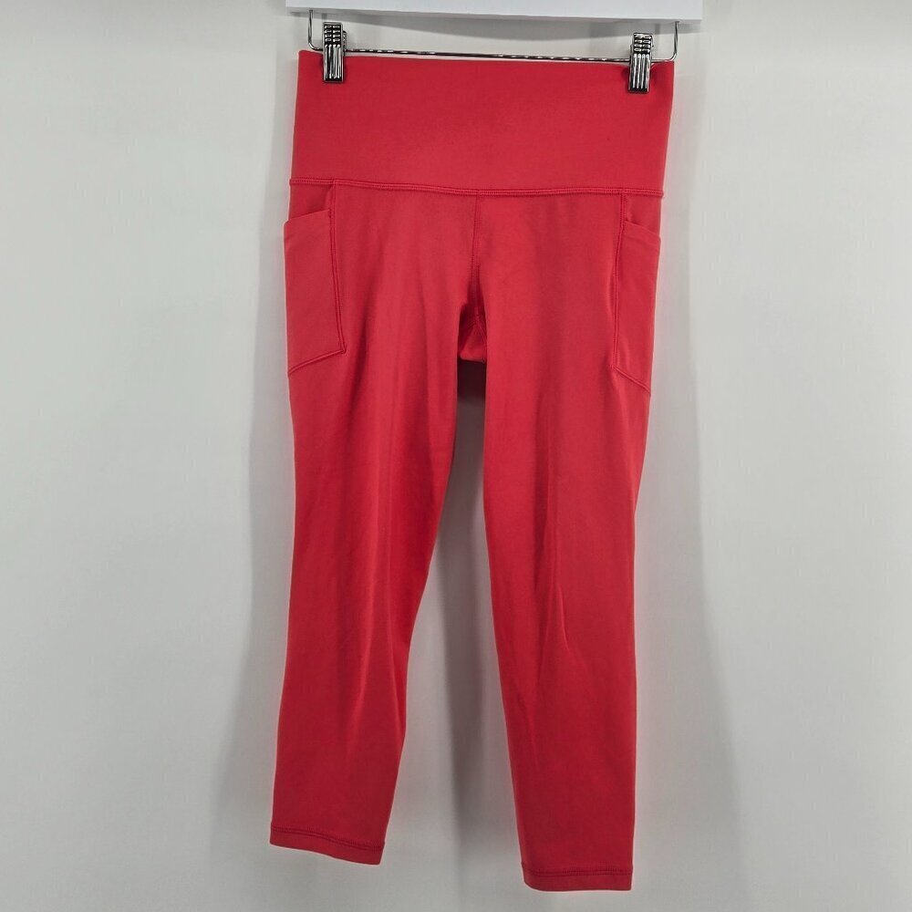 Athleta Salutation Stash High Rise Legging 21" - S Coral